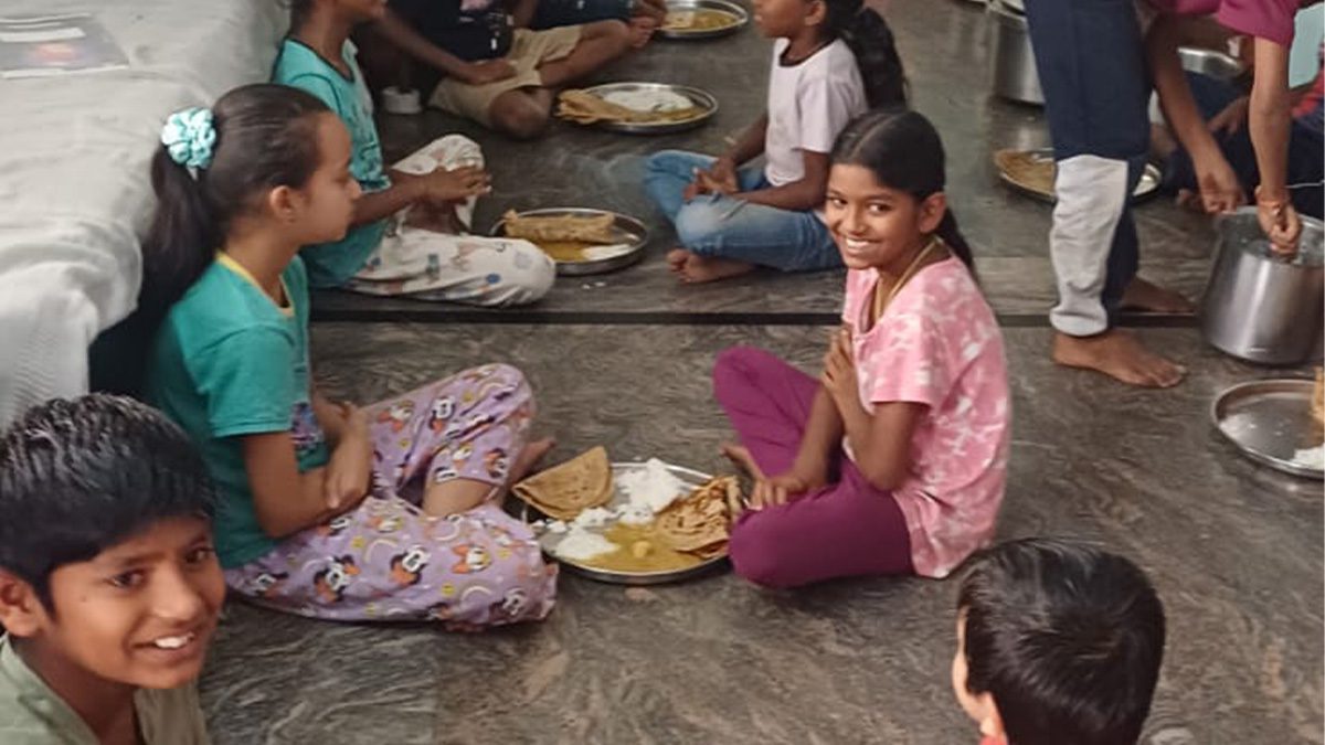Children enjoying a wholesome meal provided through the Angadi Foundation's meal support initiative at Hosabelaku Trust and Vishwa Samagama Trust.